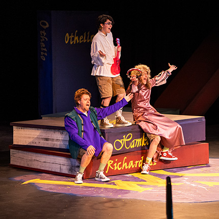 3 actors performing Shakespeare on stage