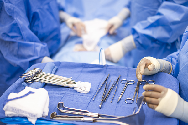 Student preparing surgical tools