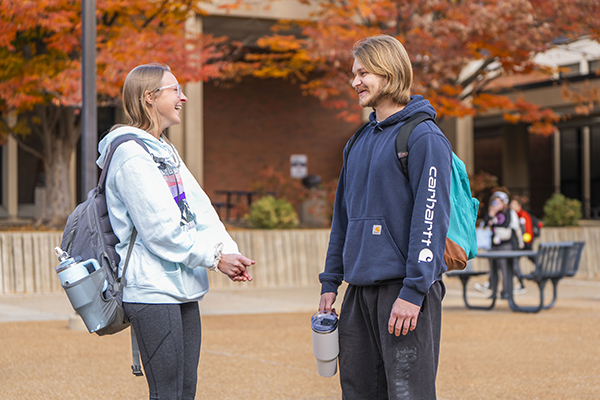 Two students talking outside on the Meramec campus