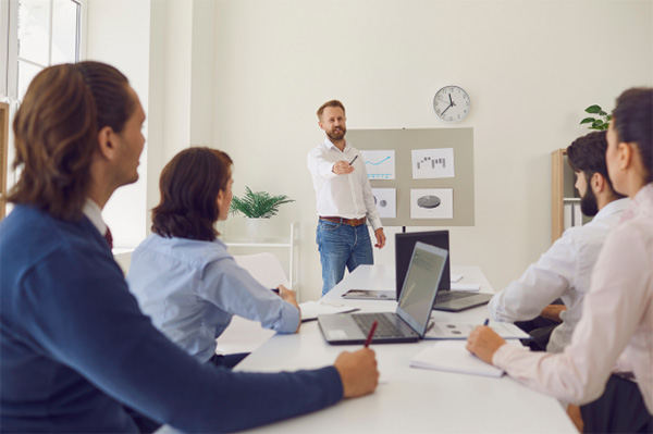 Employees participating in corporate training width=