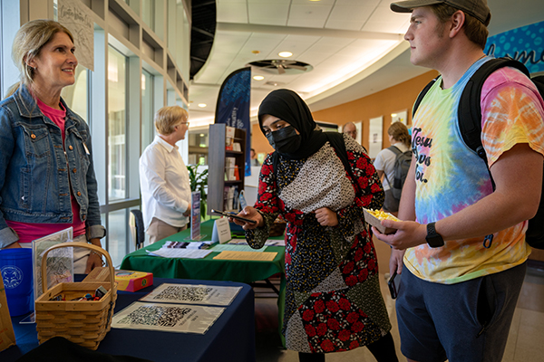 Students exploring clubs and leadership opportunities at an STLCC Campus Expo.