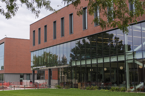 Exterior view of the Financial Services and Education Center at STLCC–Meramec, featuring large windows and updated landscaping width=