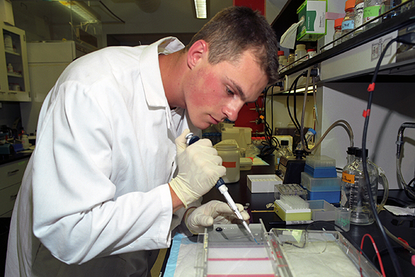 Student in an STLCC biotech class