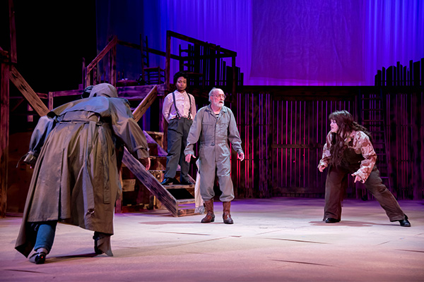 four actors performing animal farm