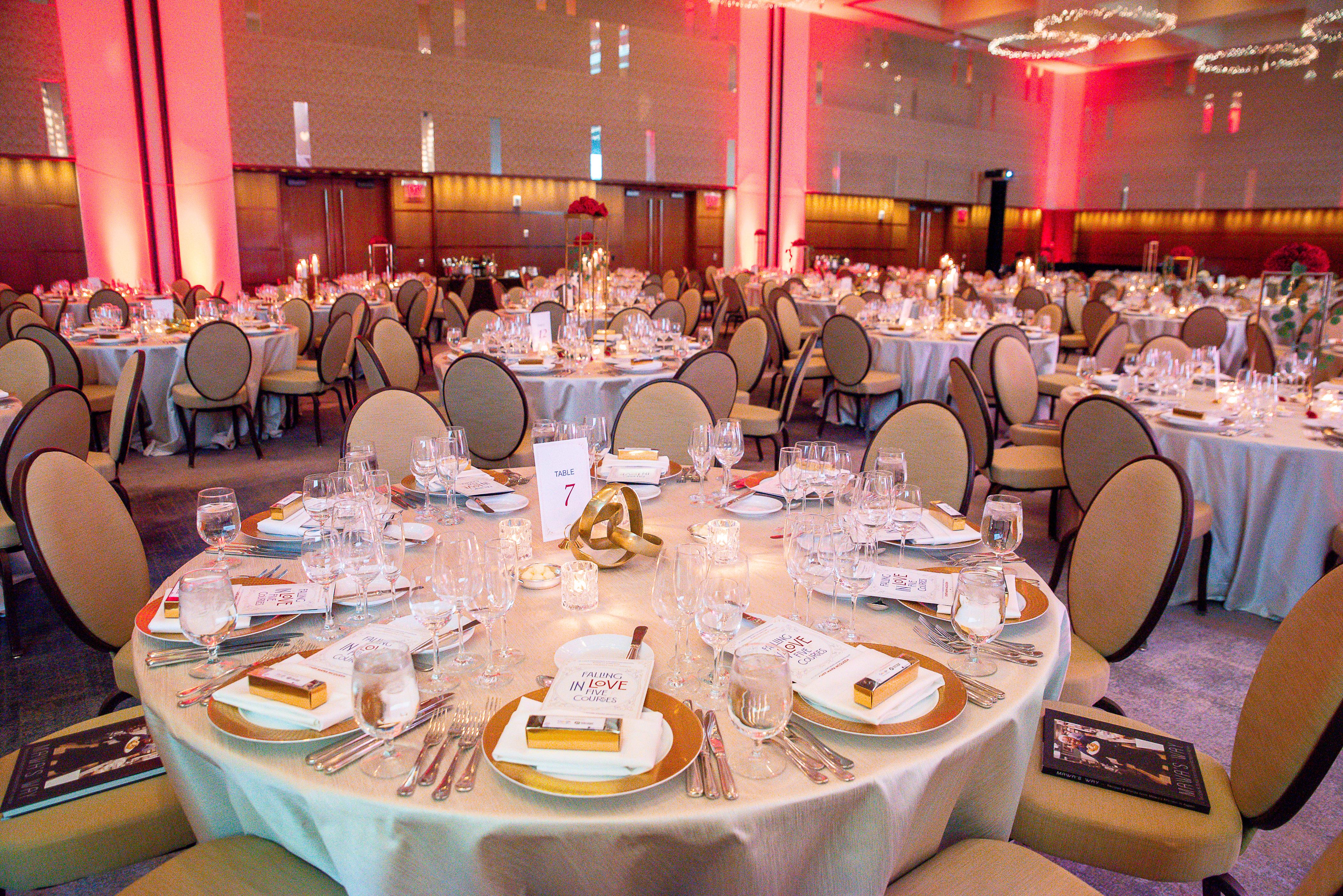 Gala tables set with plates, utensils, glasses