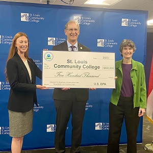 EPA officials presenting STLCC Chancellor Jeff Pittman with a ceremonial check for the Brownfields Job Training program.