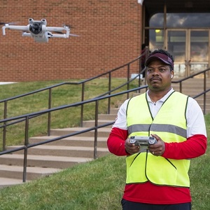 Student flying drone