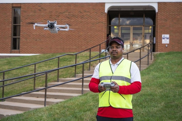 Student flying drone
