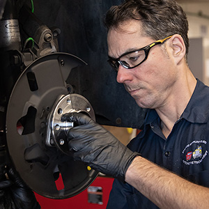 Student installing wheel