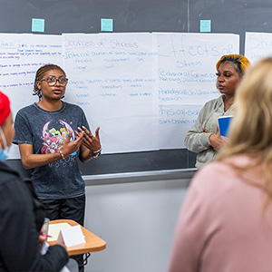 Students in front of whiteboard