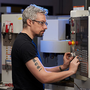 Student operating switchboard