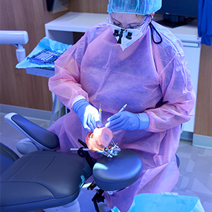 Dental student practices with training tools