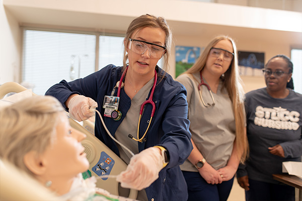 Nursing students experiencing hands-on clinical training