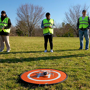 Group of students operating drones