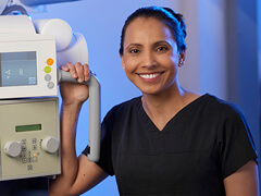 female radiology technician in hospital lab