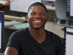 black male student in computer lab