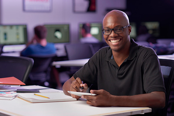 Graphic communications student using tablet