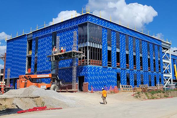 brick going up on west elevation