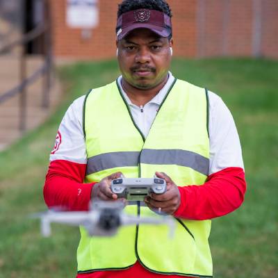 Student flying drone at Florissant Valley